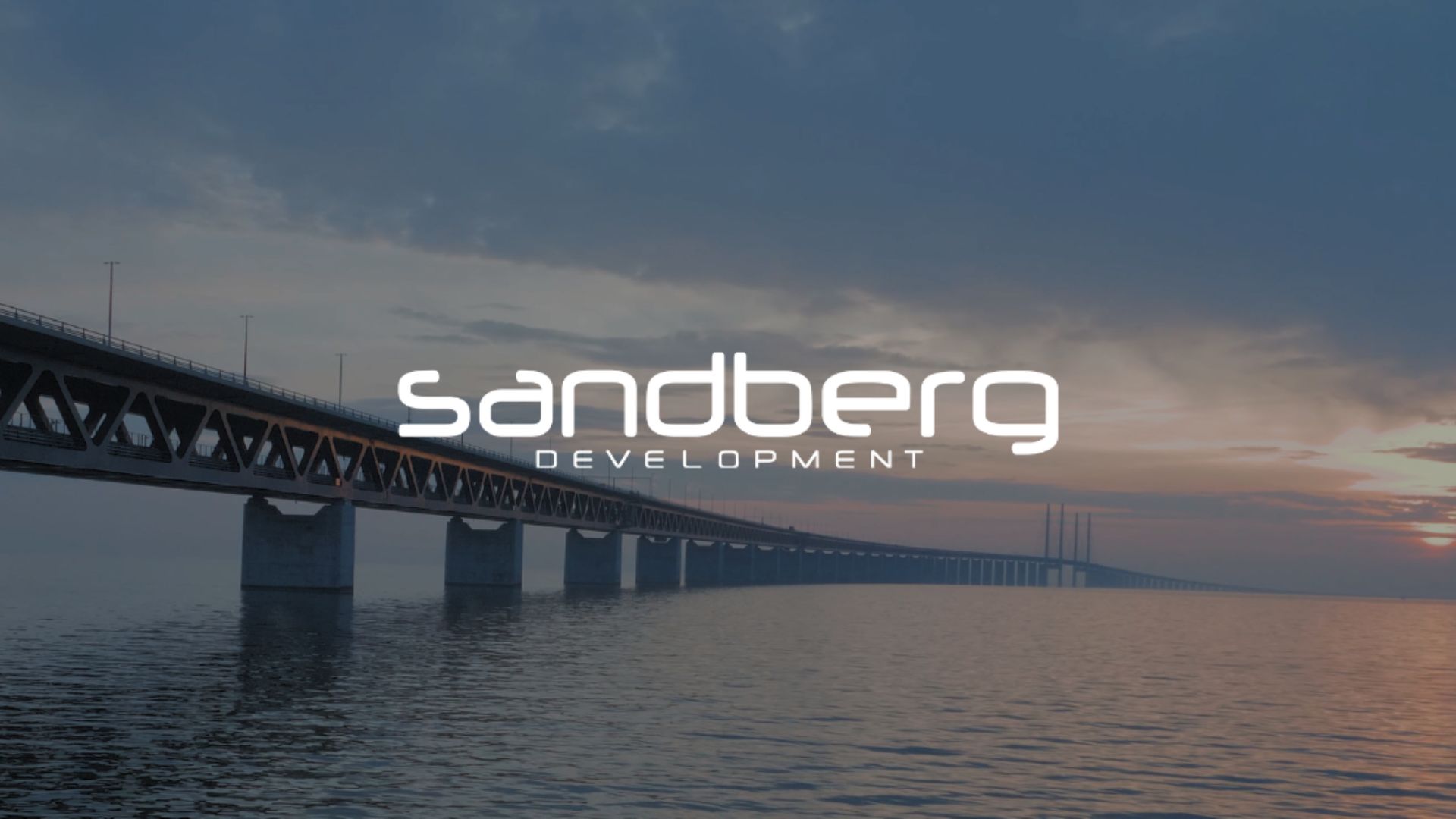 Sandberg Development logotyp bild på Öresundsbron
